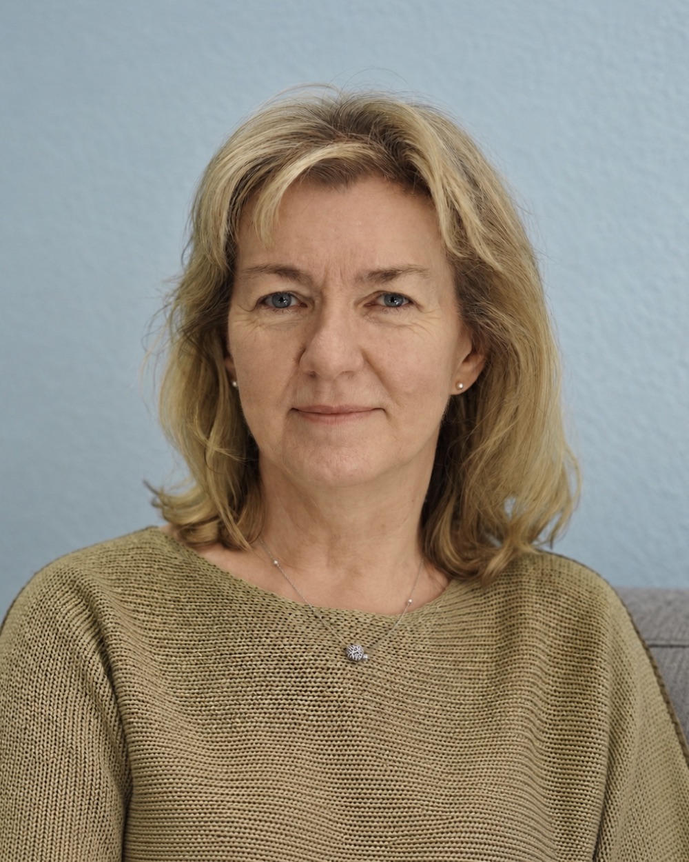 Clare Graci, counsellor and psychotherapist, smiling gently